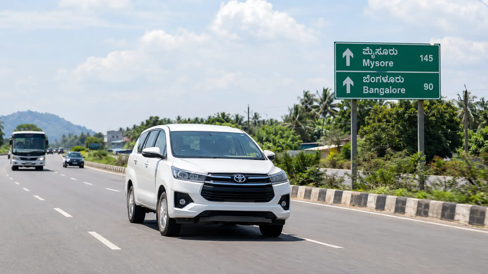 Bangalore to Mysore taxi on a highway