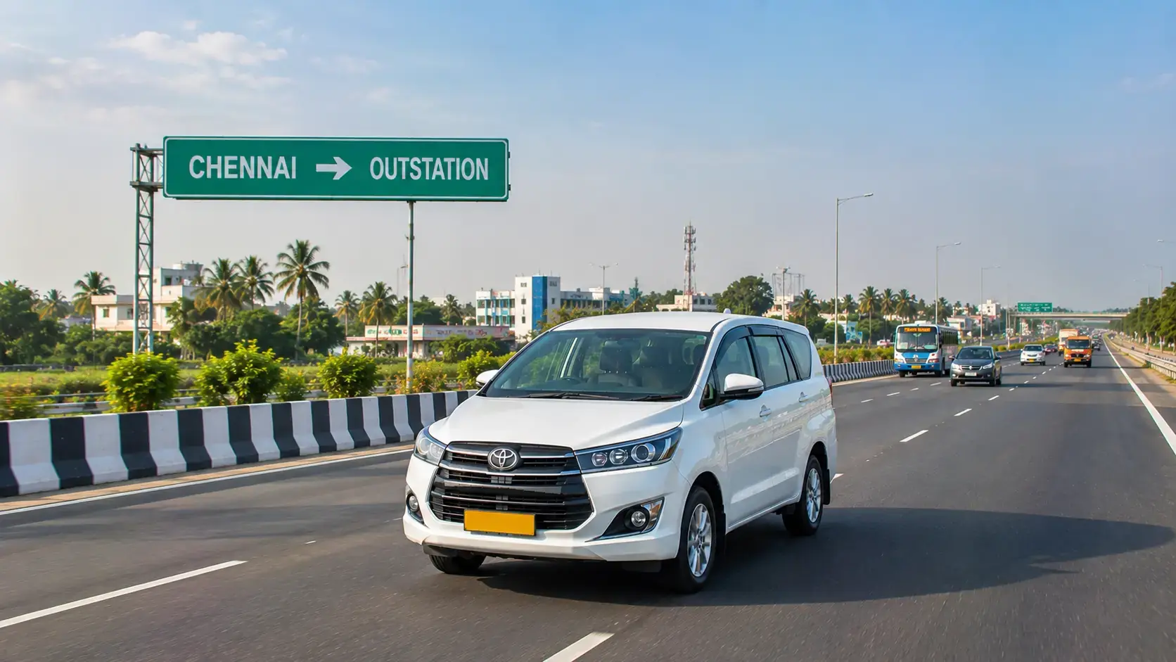 White outstation taxi travelling from Chennai on a South Indian highway